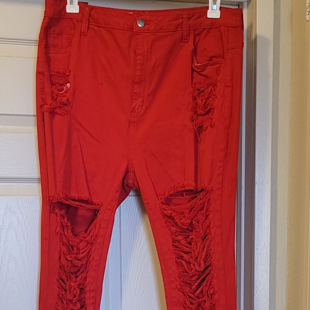 Fashion Nova Red Ripped Flate bottom jeans